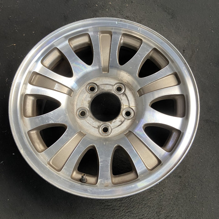 17" EXPEDITION 00 12mm lugs 14mm holes 17x7.5 aluminum 10 triangular holes gold pockets Original OEM Wheel Rim