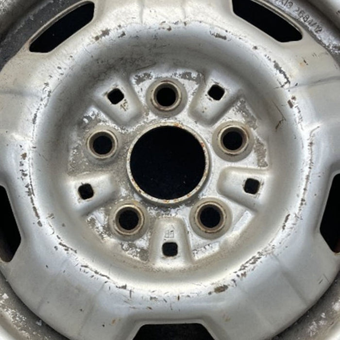 13" CAMRY 83-86 13x5, steel Original OEM Wheel Rim - Angle View