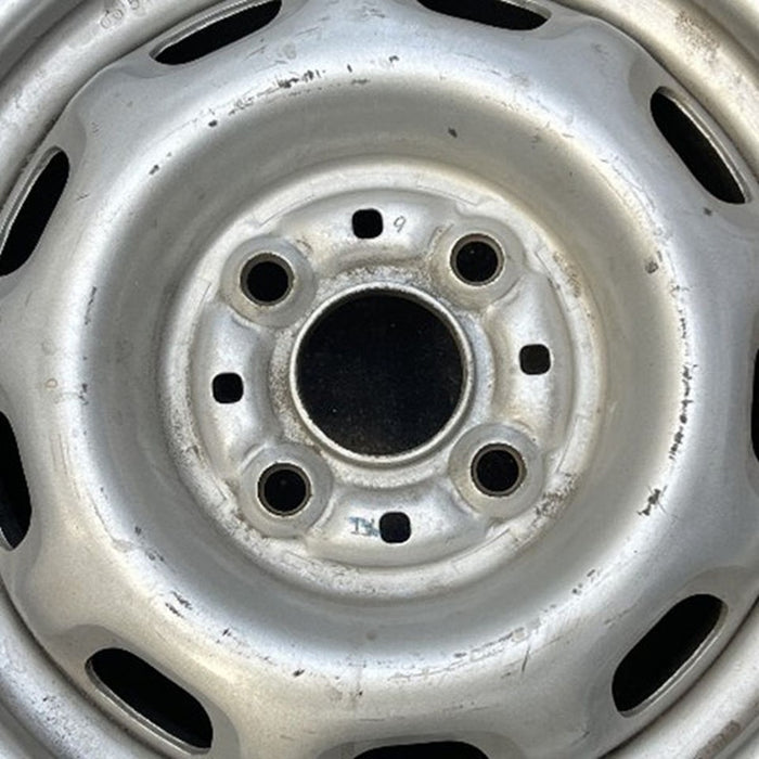 13" CELICA 86-87 13x5.5, steel, 9 hole Original OEM Wheel Rim - Angle View