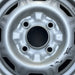 13" 310 79-82 13x4.5, silver colored Original OEM Wheel Rim - Angle View