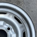 13" 310 79-82 13x4.5, silver colored Original OEM Wheel Rim - Close-Up Detail