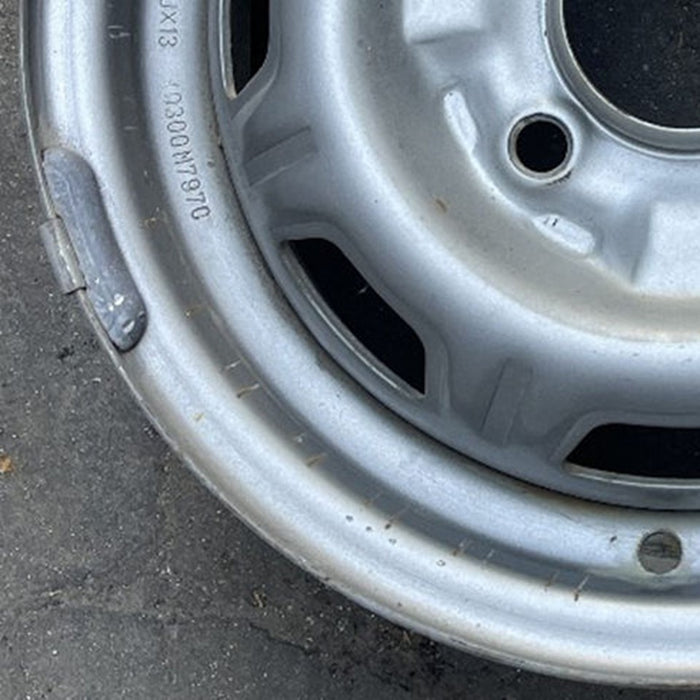 13" 310 79-82 13x4.5, silver colored Original OEM Wheel Rim - Additional View