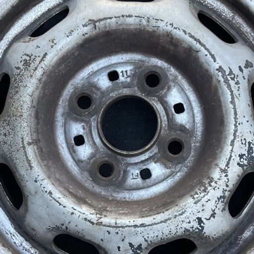 13" CELICA 88-89 13x5, 9 hole Original OEM Wheel Rim - Angle View
