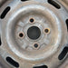 14" ESCORT 97 14x5 , silver Original OEM Wheel Rim - Angle View