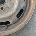 14" ESCORT 97 14x5 , silver Original OEM Wheel Rim - Back View