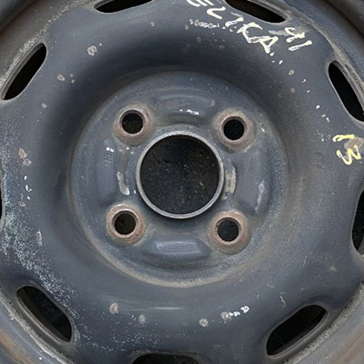 13" CELICA 86-87 13x5.5, steel, 9 hole Original OEM Wheel Rim - Angle View