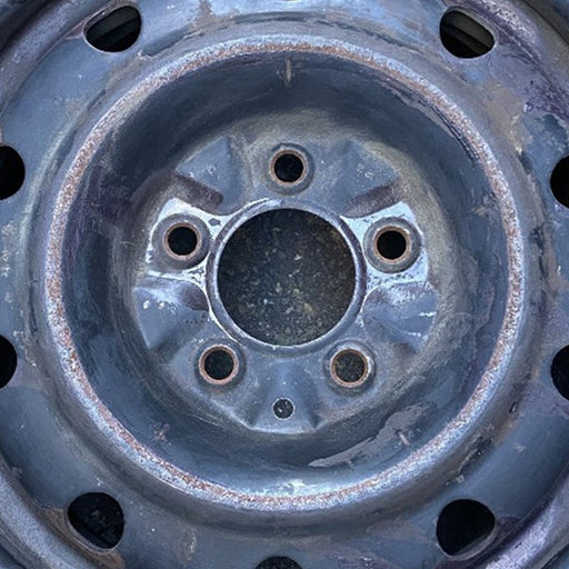 15" CARAVAN 01-07 15x6.5 Original OEM Wheel Rim - Angle View