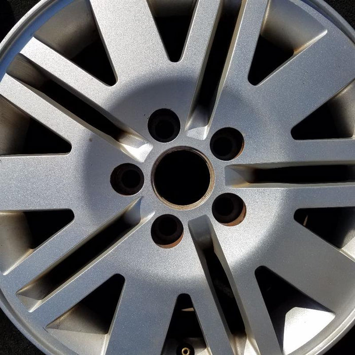 16" MARINER 05 16x7 , , 15 spoke Original OEM Wheel Rim - Angle View