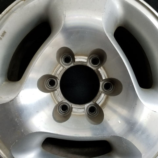 16" INFINITI QX4 97-00 16x7 3 slot Original OEM Wheel Rim - Angle View