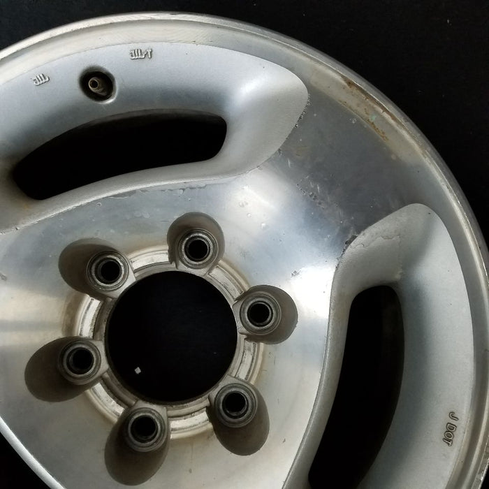 16" INFINITI QX4 97-00 16x7 3 slot Original OEM Wheel Rim - Close-Up Detail