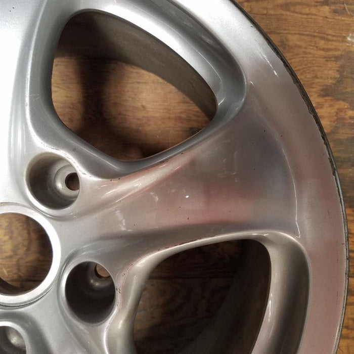 18" PORSCHE 911 99-01 18x10, 5 flared spokes Original OEM Wheel Rim - Close-Up Detail