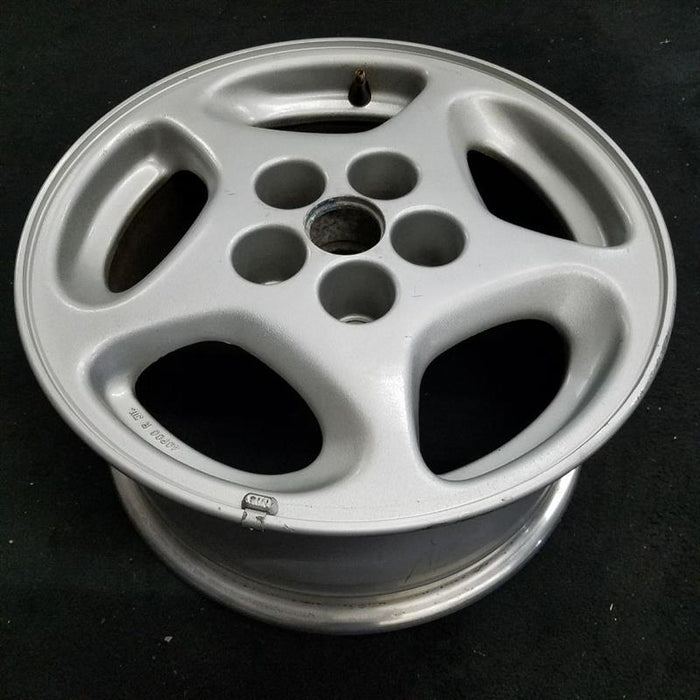 16" 300ZX 90 16x7.5 alloy 44.7mm ornament R. Original OEM Wheel Rim - Close-Up Detail