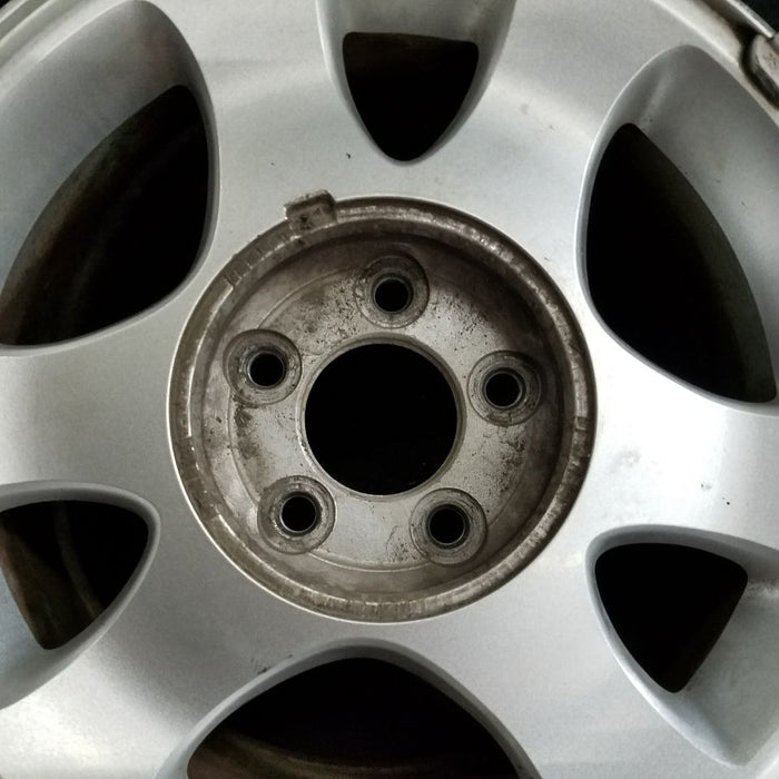 15" MUSTANG 99-01 15x7 6 spoke surface silver finish Original OEM Wheel Rim - Angle View