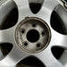 15" MUSTANG 99-01 15x7 6 spoke surface silver finish Original OEM Wheel Rim - Angle View