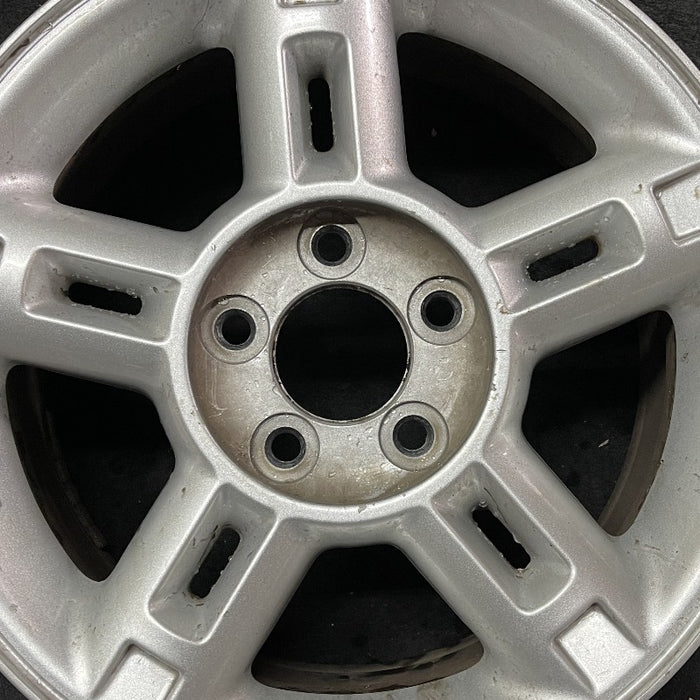 16" EXPLORER 02-03 4 Dr exc. Sport Trac; 16x7 aluminum 5 double spokes w/openings in spokes sparkle silver finish Original OEM Wheel Rim