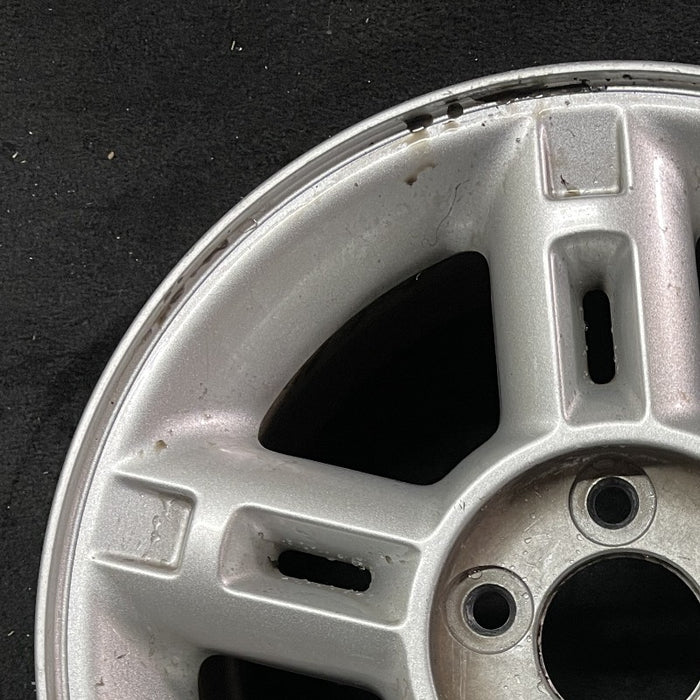 16" EXPLORER 02-03 4 Dr exc. Sport Trac; 16x7 aluminum 5 double spokes w/openings in spokes sparkle silver finish Original OEM Wheel Rim