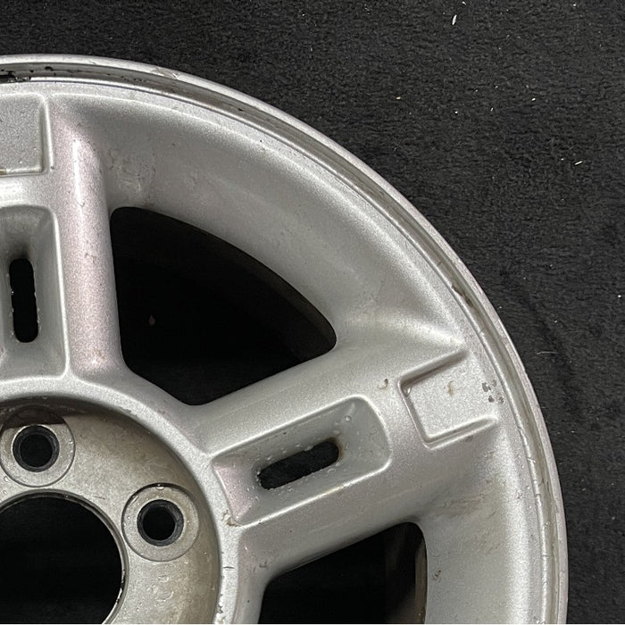 16" EXPLORER 02-03 4 Dr exc. Sport Trac; 16x7 aluminum 5 double spokes w/openings in spokes sparkle silver finish Original OEM Wheel Rim