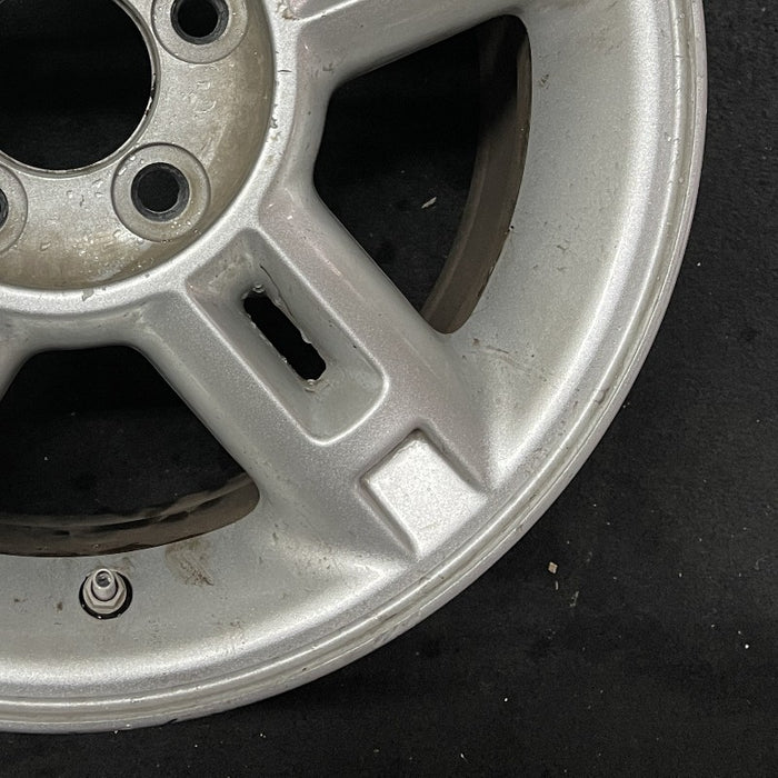 16" EXPLORER 02-03 4 Dr exc. Sport Trac; 16x7 aluminum 5 double spokes w/openings in spokes sparkle silver finish Original OEM Wheel Rim