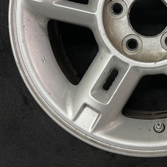 16" EXPLORER 02-03 4 Dr exc. Sport Trac; 16x7 aluminum 5 double spokes w/openings in spokes sparkle silver finish Original OEM Wheel Rim