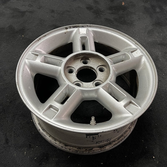 16" EXPLORER 02-03 4 Dr exc. Sport Trac; 16x7 aluminum 5 double spokes w/openings in spokes sparkle silver finish Original OEM Wheel Rim