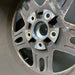 16" GRAND CHEROKEE 99-00 16x7, aluminum, 5 large triangular holes Original OEM - Back View