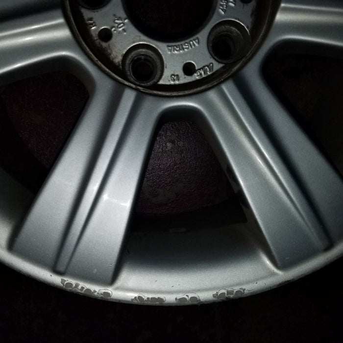 17" BMW 320i 01-05 Sdn Canada market 17x8 alloy 7 spoke covered lug nuts Original OEM Wheel Rim